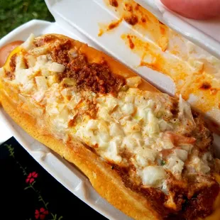 Boss Hog Chili Dog... topped with Coleslaw.  Eat it fast.. It'll get soggy!