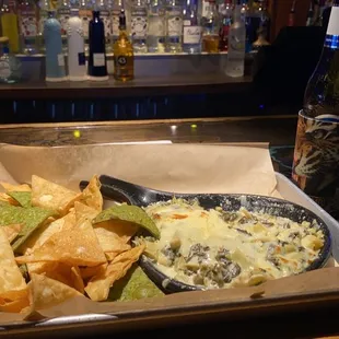 a tray of nachos and chips