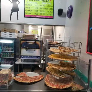 Nice selection of tasty pizza by the slice