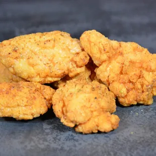 a pile of fried chicken