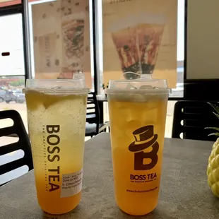 two cups of iced tea on a table