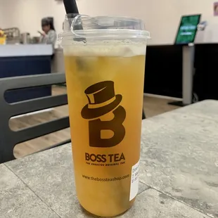 a glass of iced tea on a table