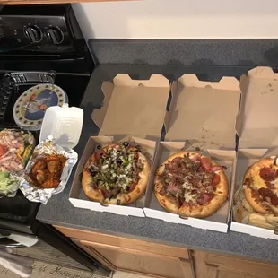 Chef salad, lemon pepper hot wings, small Big O, small The Herd and kids pepperoni.