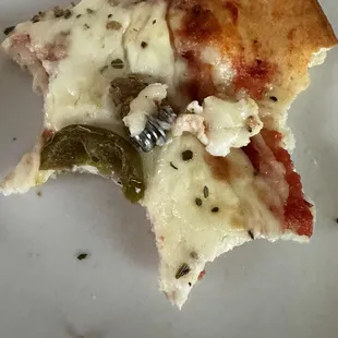 Screw found on a slice of pizza