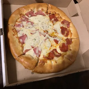 Pizza with 1 Topping extra cheese 1/2 pepperoni  1/2 Canadian Bacon