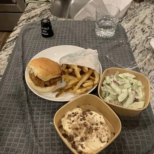 Best Chicken Sandwich with a side of fries and banana pudding and cucumbers salad. Ps Chicken sandwich is the best to order.