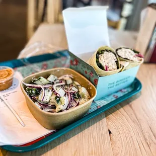 Chicken salad wrap and cucumber salad