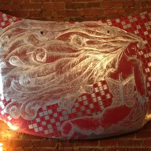 Carved car hood art