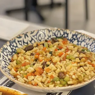 a bowl of rice and vegetables