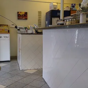 a view of a kitchen with a counter and oven