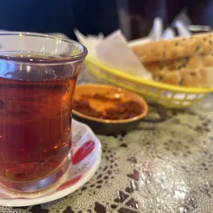 a cup of tea and a plate of cookies