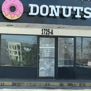  donut shopfront with a pink frosted donut