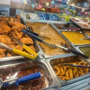Hot bar showing the Fried Chicken, Salsbury Steak, Onion Rings, Corn, Green Beans as posted on their Facebook 3/22/24