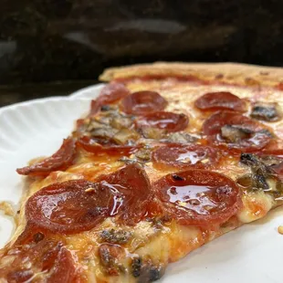 a slice of pepperoni pizza