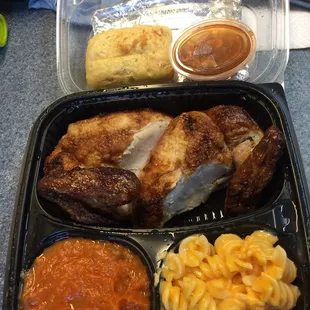 Half-chicken plate white meat, with two sides and a cornbread.