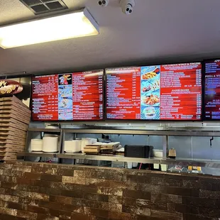menus on a brick wall