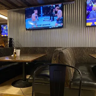 two televisions on the wall