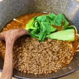 a wooden spoon in a bowl