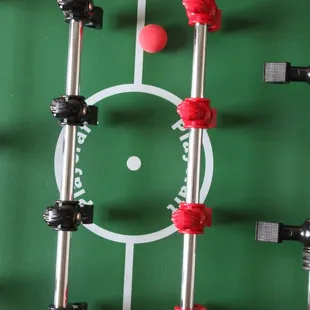 Challenge a friend to a friendly game of foosball!