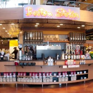 a woman standing in front of the counter