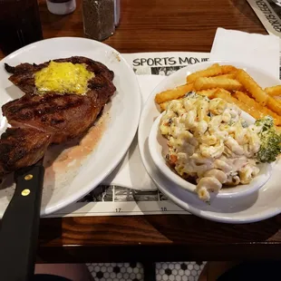 Ribeye, macaroni salad and fries