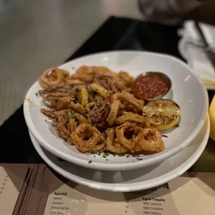 a plate of fried onion rings