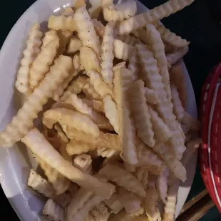 This is a small order of crinkle fries, huge position