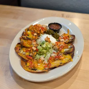 Boston&apos;s nachos - happy hour size, $6 + $2 extra for spicy chicken add-on