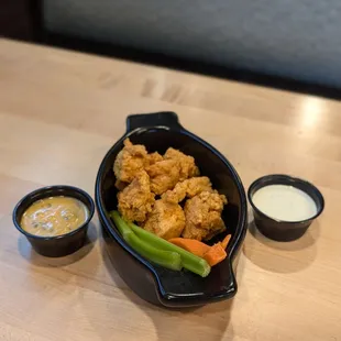 Happy hour snack wings with garlic parmesan on the side