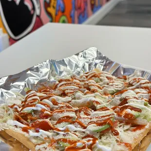 a close up of a piece of pizza