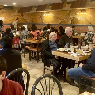 a large group of people eating