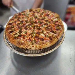 Mexican Pizza after cooking. Sam cooked my pizza and is very kind. I will be back because of Sam.