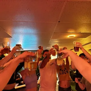 a group of people toasting