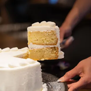 a slice of cake being cut