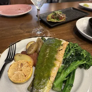 BRANZINO Branzino fillet with Greek fish sauce, served with grilled vegetables