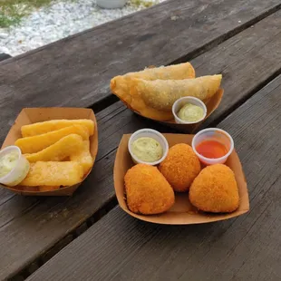 two plates of food on a picnic table