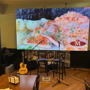 a large screen in a restaurant