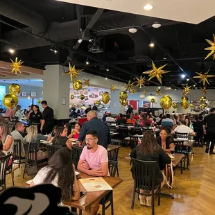 a restaurant filled with people