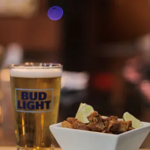 Budlight and Pork belly appetizer.