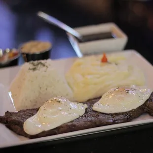 Steak with eggs.
