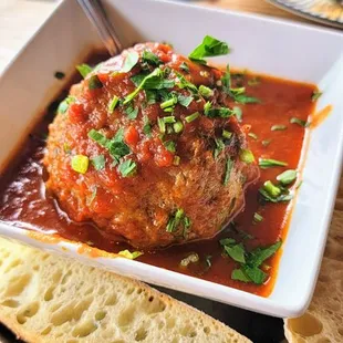 This giant, amazing albondiga (meatball)