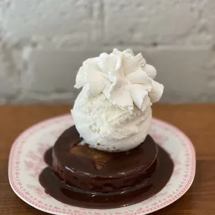 a chocolate dessert with whipped cream on top