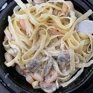 Create Your Own Pasta - Fettuccine alfredo with shrimp and mushrooms.
