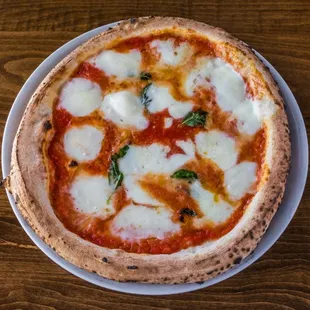 Margherita Pizza
homemade dough, San Marzano D.O.P. tomato sauce, fior di latte mozzarella, organic basil, evoo