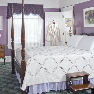 The Tingley Room has a 4-poster queen bed and private bath with shower. Great sunset and front yard views.