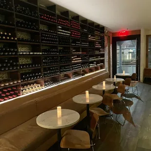 rows of wine bottles in a wine cellar