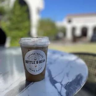 a cup of coffee on a table