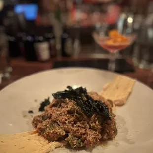 Lamb ragu, spinach rigatoni, labneh, &amp; pistachio