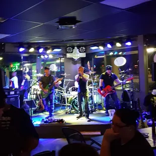 a band playing on stage