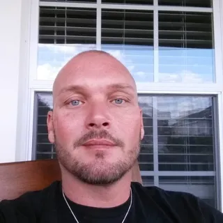 Curtis B.